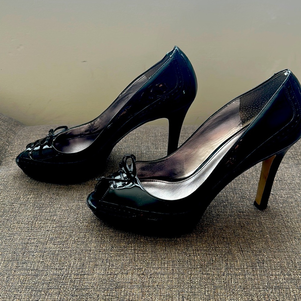 Black patent leather peep toe heels